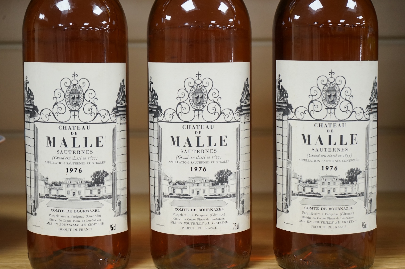 Three bottles of Chateau de Malle Sauternes Grand Cru Classe 1976
